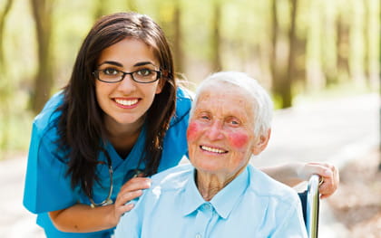 Parkinson's Home Care New Port Richey, FL Parkinson's Patient in wheelchair with caregiver