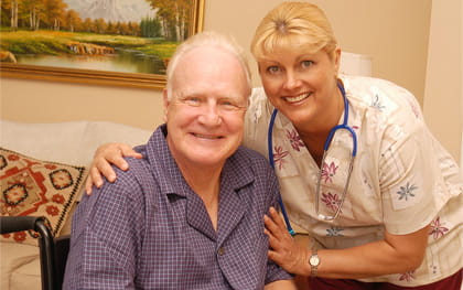 Senior Home Care New Port Richey, FL Elderly man in wheelchair with caregiver